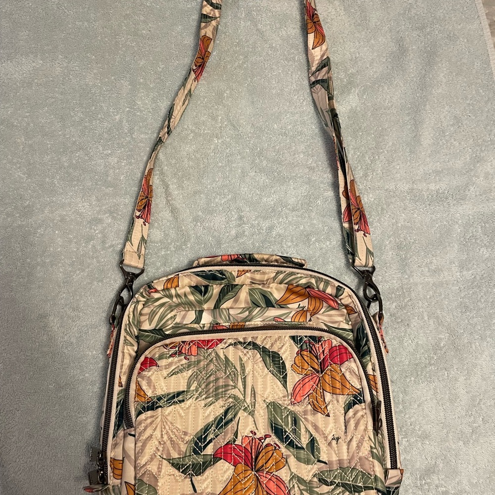 Lug “Ranger” Crossbody Bag in Cream and Green tropical print.